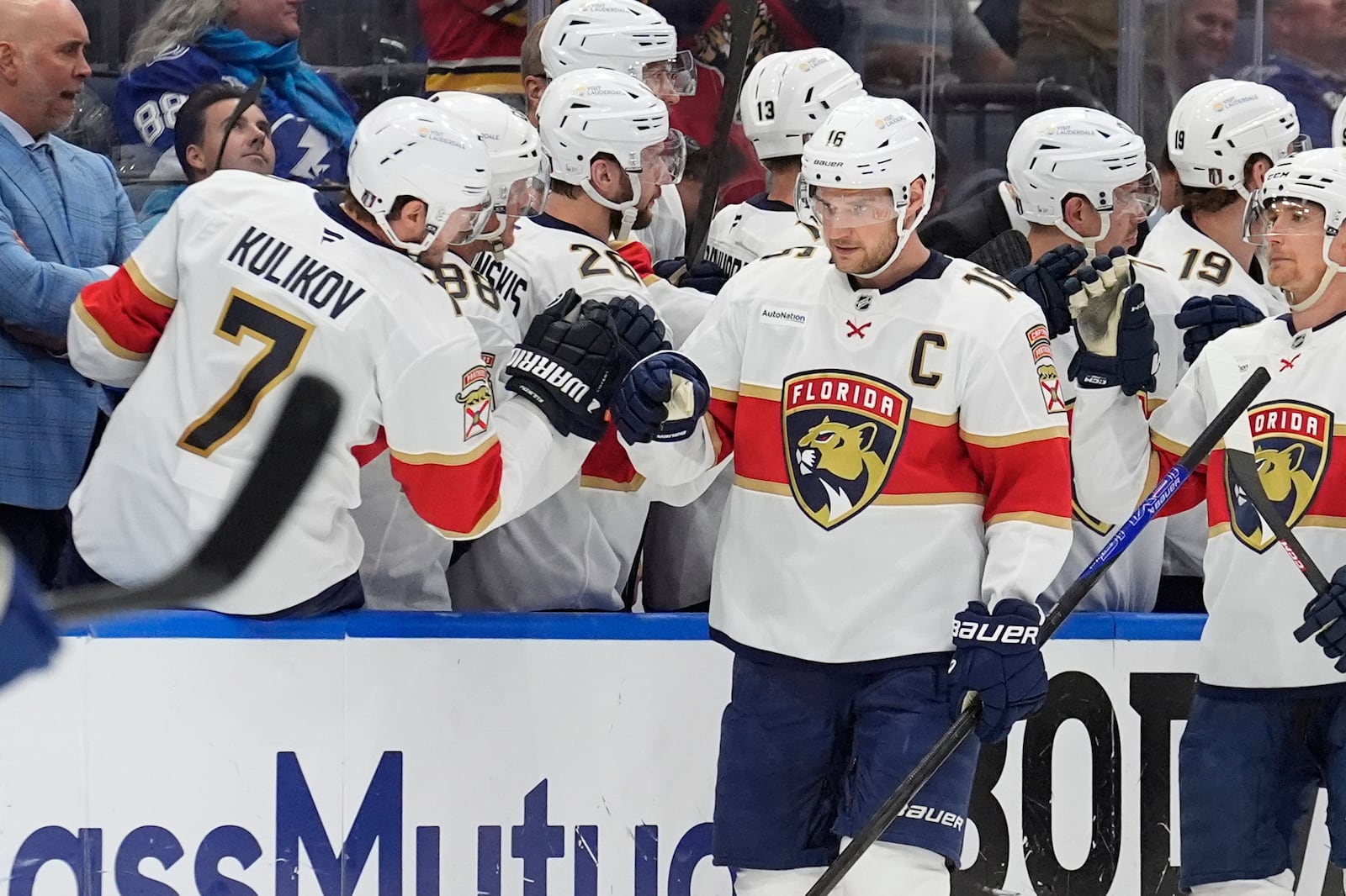 Florida Panthers center Aleksander Barkov (16) celebrates with the bench after scoring against the Tampa Bay Lightning during the second period in Game 5 of an NHL hockey Stanley Cup first-round playoff series, Wednesday, April 30, 2025, in Tampa, Fla. (AP Photo/Chris O'Meara)