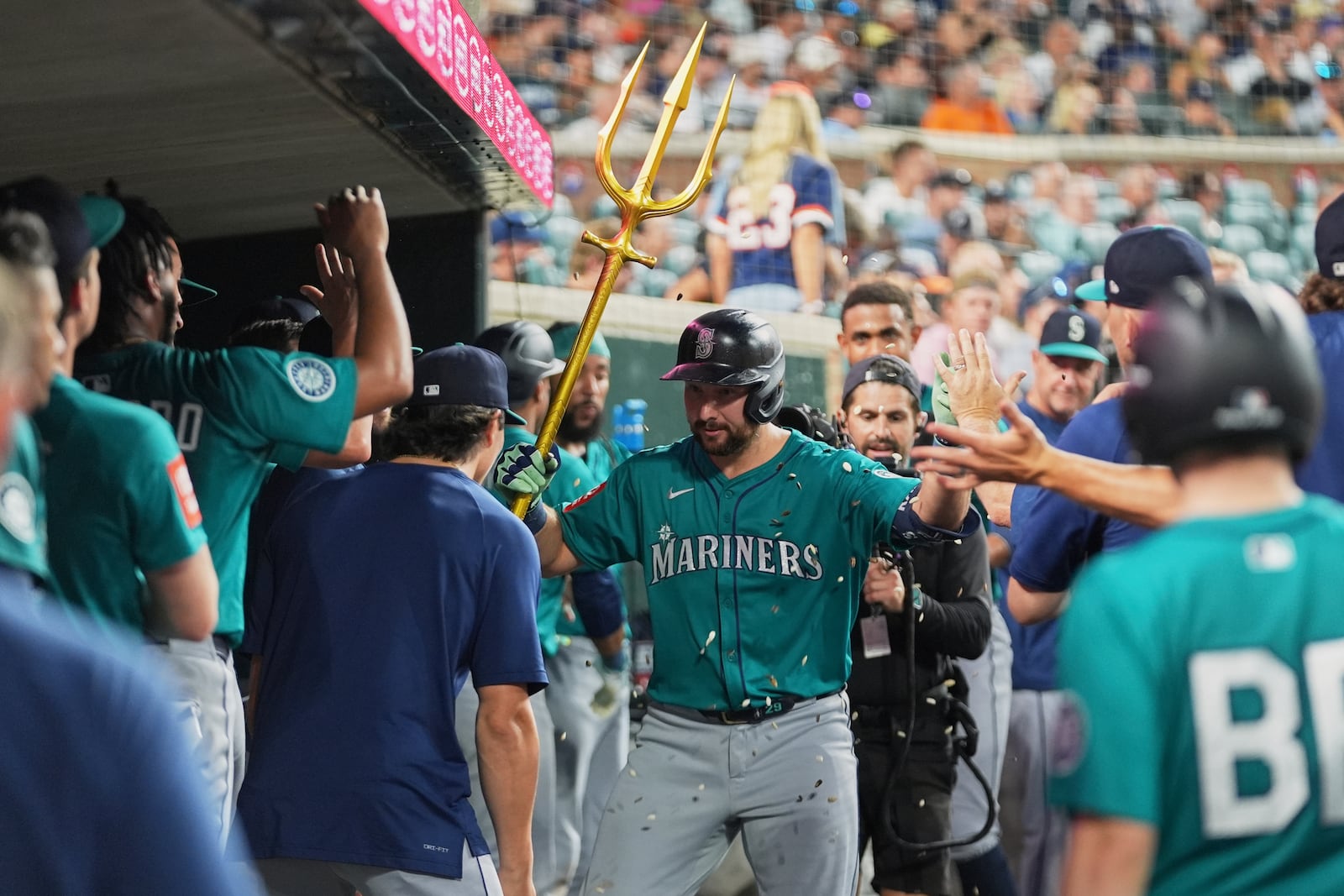 Seattle Mariners catcher Cal Raleigh celebrates his home run against the Detroit Tigers in the eighth inning during a baseball game, Friday, July 11, 2025, in Detroit. (AP Photo/Paul Sancya)