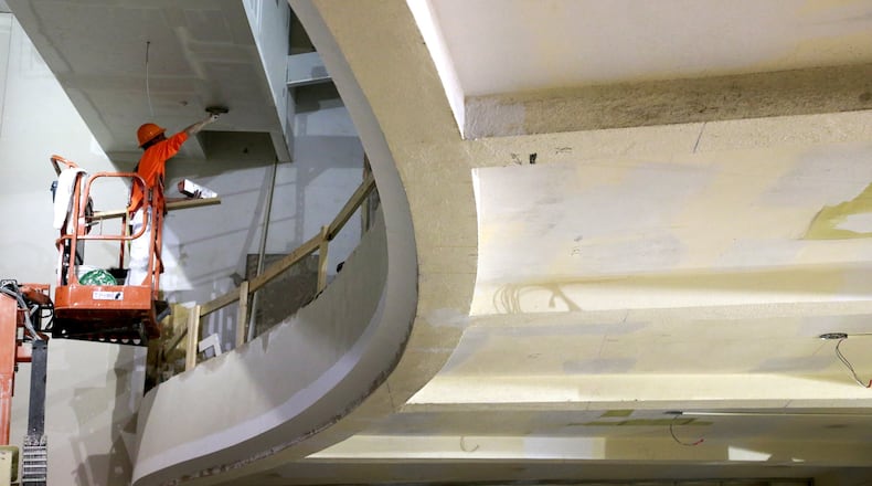 Work continues on the balcony area of the John Legend Theater at The Dome Monday. Bill Lackey/Staff