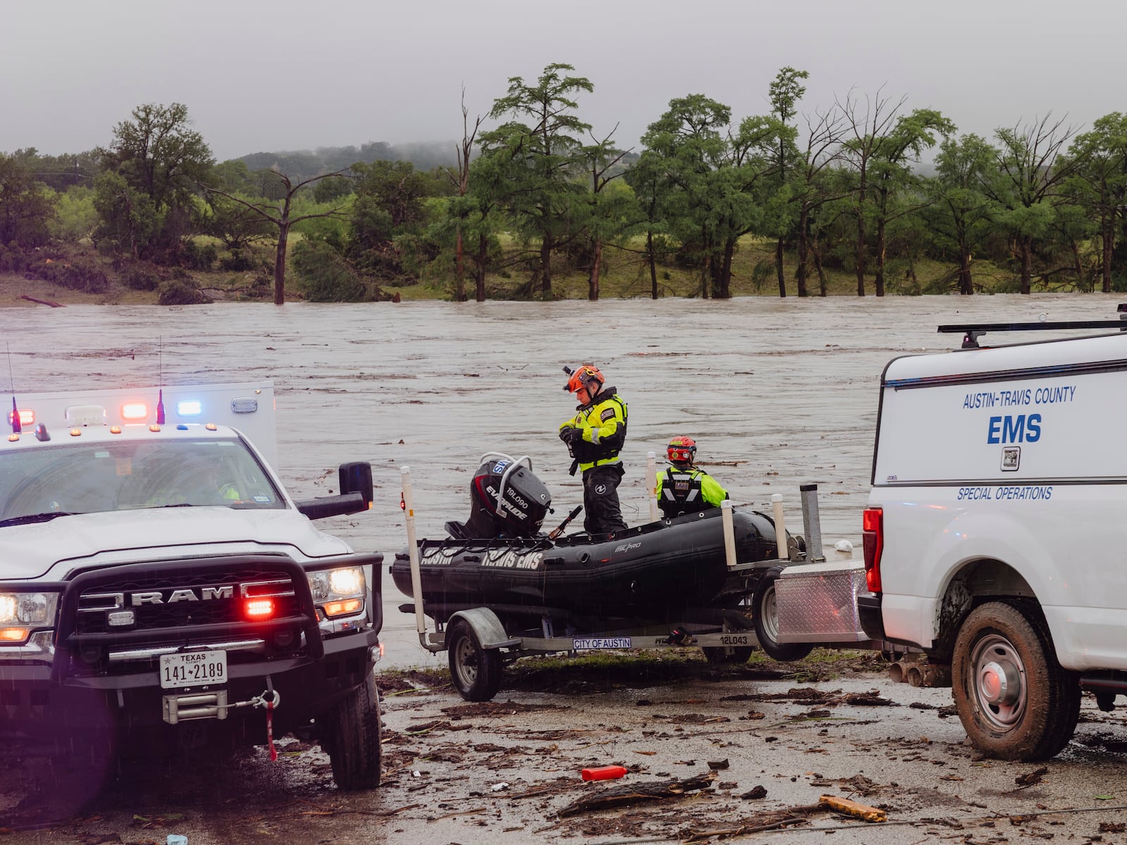 Members of Task Force 1 deploy boats along the Guadalupe River in the wake of a destructive flooding event in Kerrville on Friday July 4, 2025. (Christopher Lee/The San Antonio Express-News via AP)