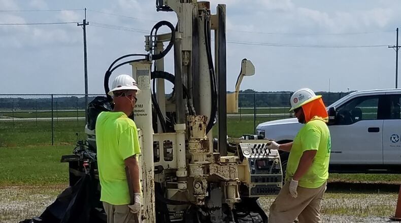 A direct-push technology drill rig collects subsurface soil-sample cores July 28 last year at the Fire Training Area on Wright-Patterson Air Force Base. CONTRIBUTED PHOTO