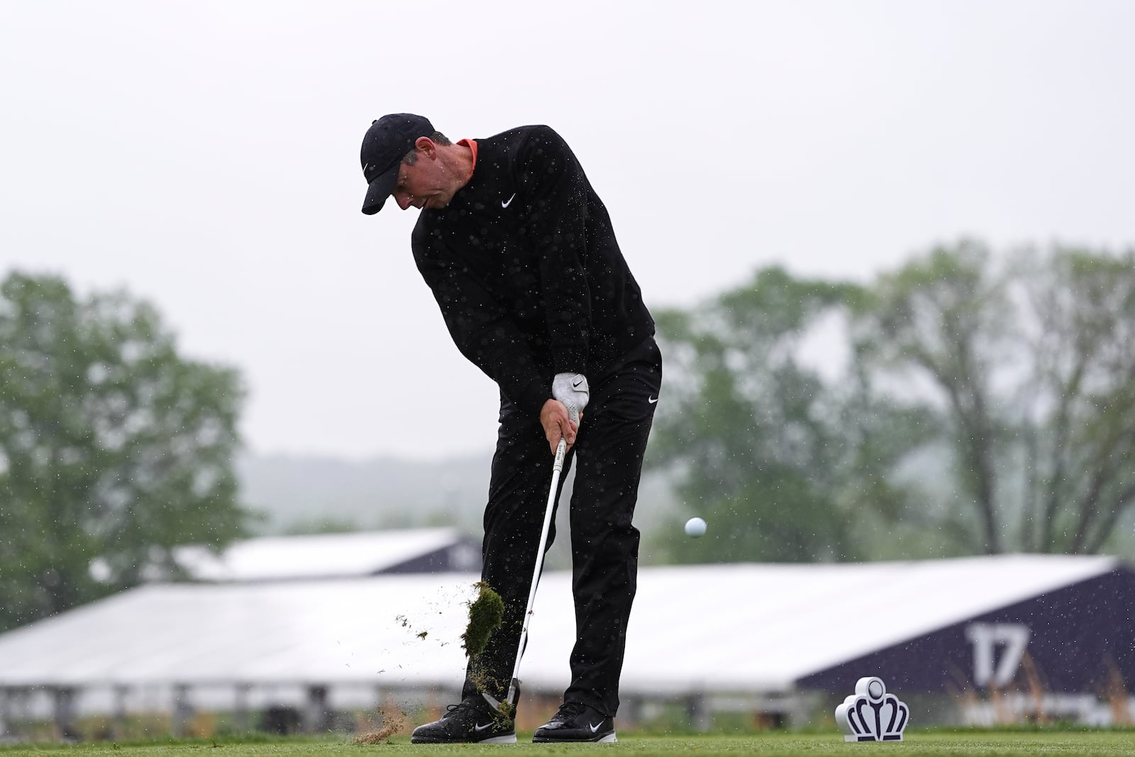 Rory McIlroy, of Northern Ireland, hits on the 14th hole during the second round of the Truist Championship golf tournament at the Philadelphia Cricket Club, Friday, May 9, 2025, in Flourtown. (AP Photo/Matt Rourke)
