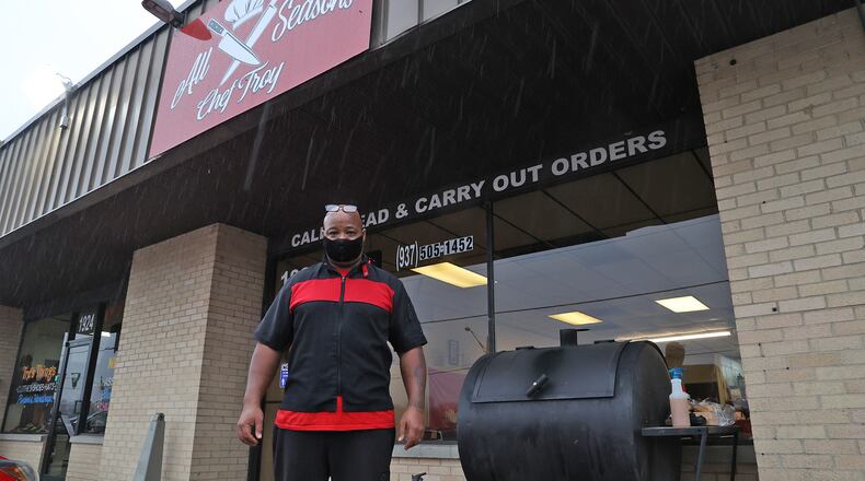 Troy Wheat in front of his restaurant All Seasons Wednesday. Bill Lackey/Staff