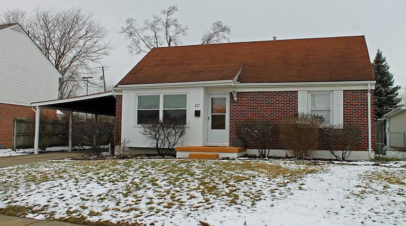 This brick-and-vinyl home features a family room in the full, finished basement. The home has about 1,360 sq. ft. of living space and a carport. CONTRIBUTED PHOTO BY VICKIE KAPNAS