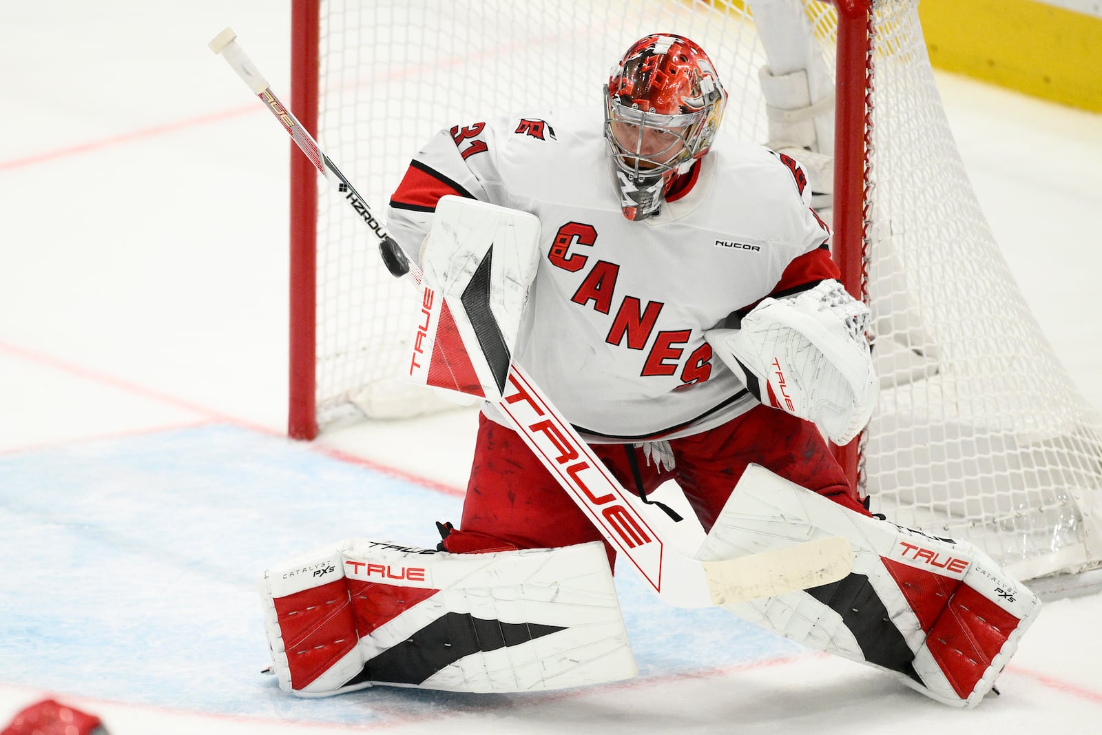 Carolina Hurricanes goaltender Frederik Andersen (31) stops the puck in the third period of Game 5 of a second-round NHL hockey playoff series against the Washington Capitals Thursday, May 15, 2025, in Washington. (AP Photo/Nick Wass)