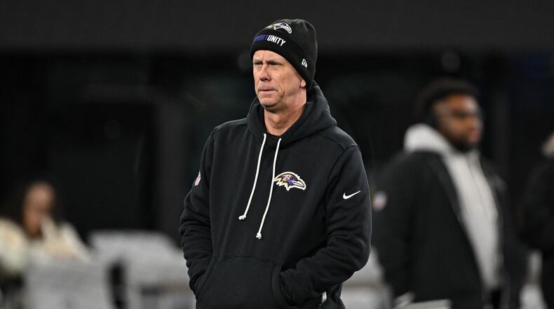 FILE - Baltimore Ravens offensive coordinator Todd Monken looks on during pre-game warm-ups before an NFL football game against the New England Patriots, Sunday, Dec. 21, 2025, in Baltimore. (AP Photo/Terrance Williams, File)