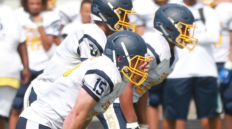 Top-ranked Springfield (D-I) opened the high school football season with a 44-7 win at Hilliard Bradley. MARC PENDLETON / STAFF