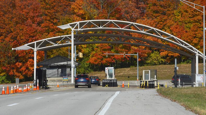 With vibrant fall colors popping in the background, vehicles enter Wright-Patterson Air Force Base through Gate 22B on Nov. 3. U.S. AIR FORCE PHOTO/R.J. ORIEZ