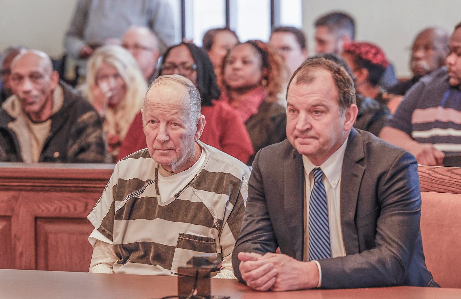 William Brock, left, and his defendant attorney Jon Paul Rion listen as a judge speaks at Brock's sentencing at the Clark County Common Pleas Court on Friday, Jan. 30, 2025, in Springfield. The 83-year old was convicted of shooting Hall, a 61-year-old Uber driver, in March 2024 because he reportedly believed she was trying to rob him after scammers deceived them. JOSEPH COOKE/STAFF