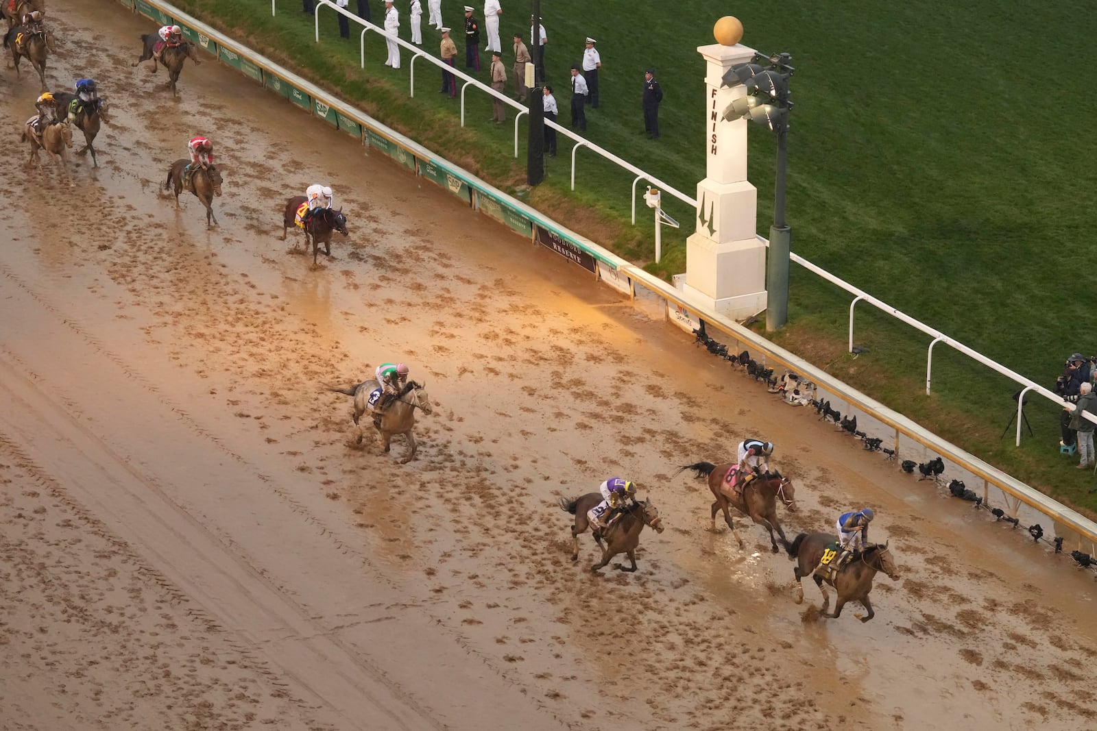Sovereignty, ridden by Junior Alvarado, right, crosses the finish line to win the 151st running of the Kentucky Derby horse race at Churchill Downs Saturday, May 3, 2025, in Louisville, Ky. (AP Photo/Charlie Riedel)