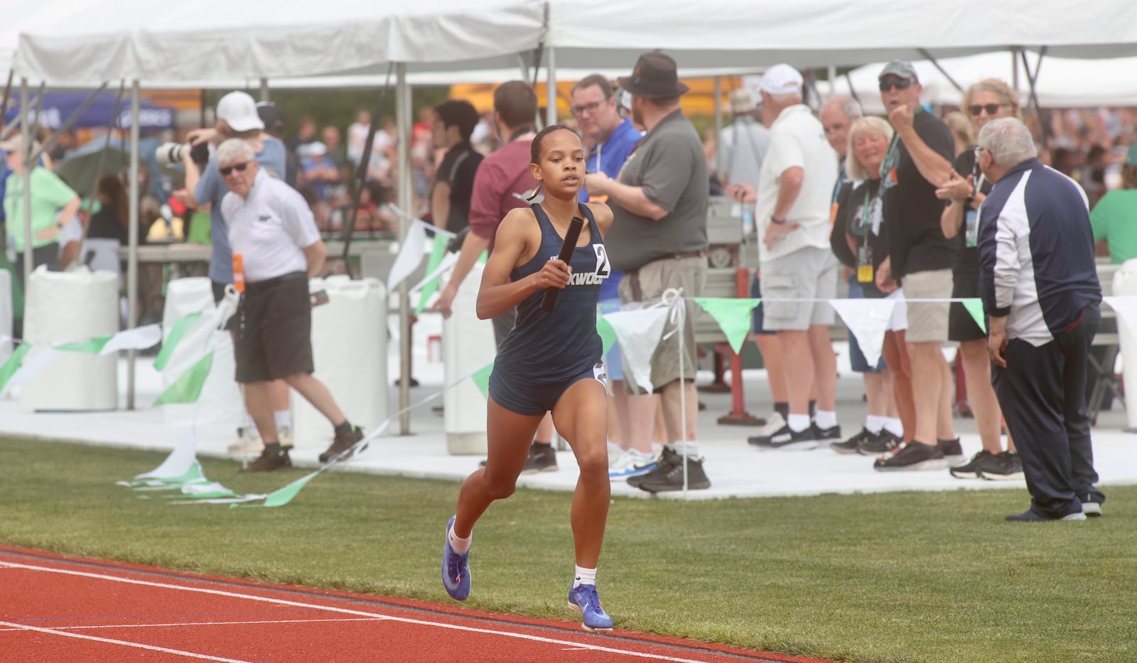 Oakwood's Kaya Asinjo races to victory in the final leg of the 4x800 relay at the Division II state track and field championships on Friday, June 6, 2025, at Jesse Owens Memorial Stadium in Columbus.