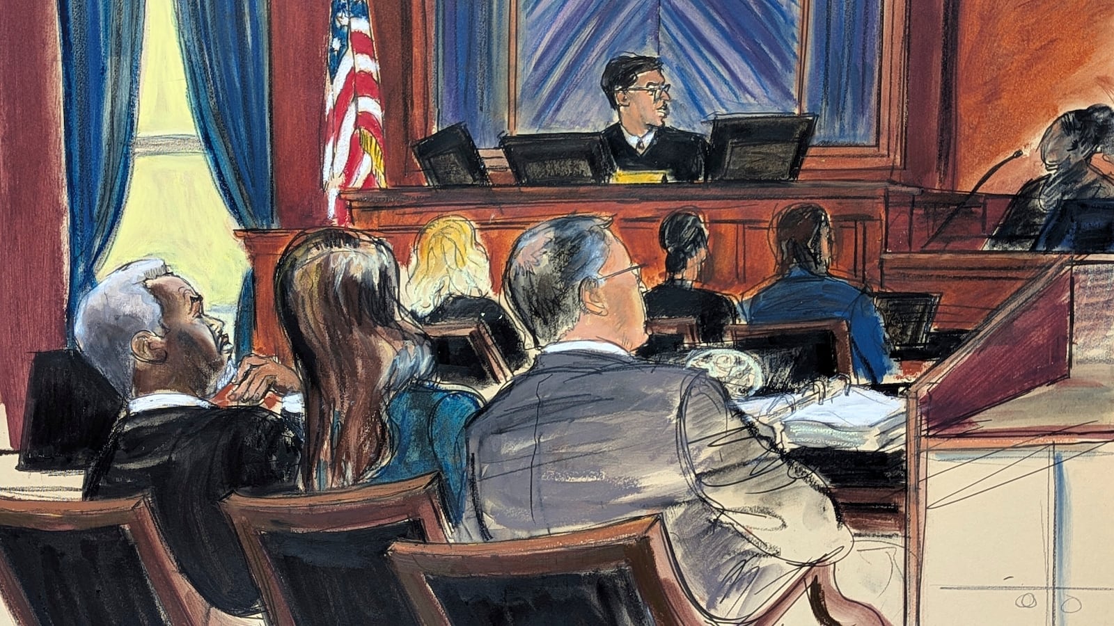 Sean 'Diddy' Combs, far left, looks on from the defense table with his attorneys, as a prospective juror, far right, answers questions posed by Judge Arun Subramanian, center, at Manhattan federal court, Monday, May 5, 2025, in New York. (Elizabeth Williams via AP)