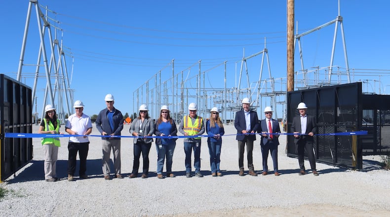 Preparing to cut the ribbon at the new AES Ohio Fayette substation in Jeffersonville in October 2024. Contributed