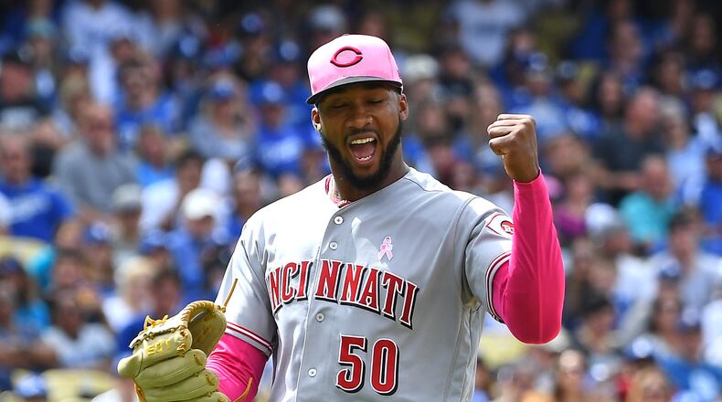 LOS ANGELES, CA - MAY 13:  Amir Garrett #50 of the Cincinnati Reds reacts as he leaves the field after pitching a scoreless seventh inning against the Los Angeles Dodgers at Dodger Stadium on May 13, 2018 in Los Angeles, California.  (Photo by Jayne Kamin-Oncea/Getty Images)