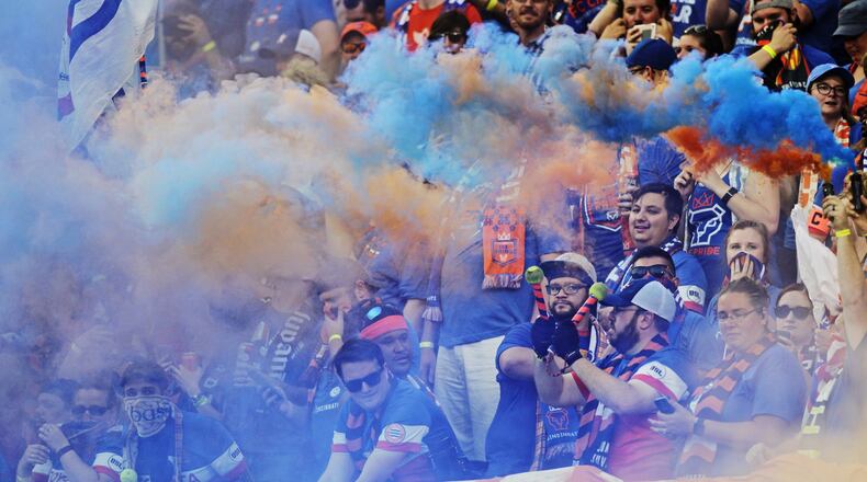 FC Cincinnati fans in the Bailey cheer on their team during their 2017 Lamar Hunt U.S. Open Cup semifinal game against New York Red Bulls Tuesday, Aug. 15 at Nippert Stadium on the University of Cincinnati Campus in Cincinnati. NICK GRAHAM/STAFF