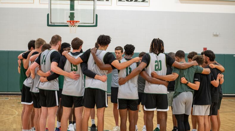 Wright State coach Clint Sargent (center) talks to his players during a workout this summer. Wright State Athletics photo