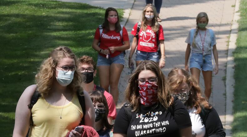 Wittenberg University students walk on campus on Aug. 26. BILL LACKEY/STAFF