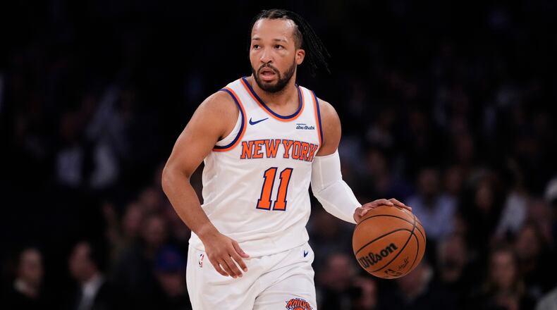 New York Knicks' Jalen Brunson (11) looks to pass during the first half of an NBA basketball game against the Orlando Magic Wednesday, Nov. 12, 2025, in New York. (AP Photo/Frank Franklin II)