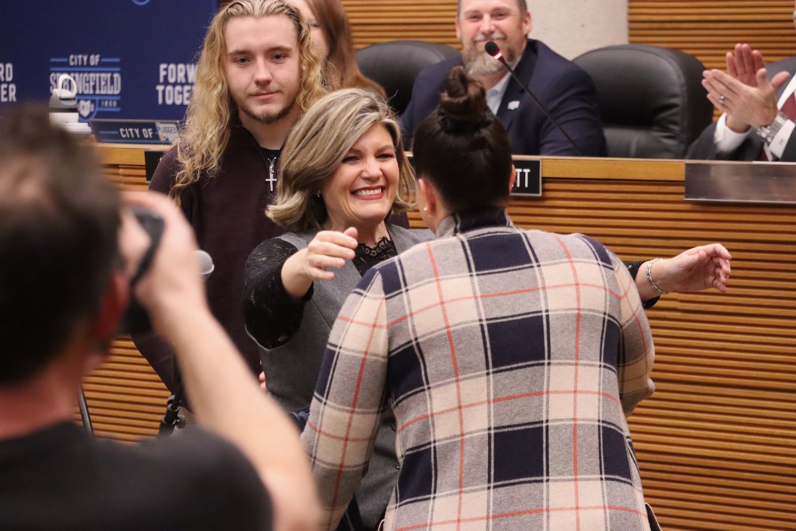Assistant Mayor Tracey Tackett hugs Springfield Police Chief Allison Elliott after she swears her in to her new position Friday, Jan. 2, 2026. JESSICA OROZCO/STAFF