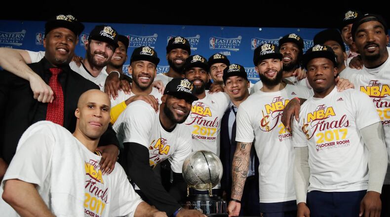 BOSTON, MA - MAY 25: The Cleveland Cavaliers pose with the Eastern Conference Championship Trophy after defeating the Boston Celtics 135-102 in Game Five of the 2017 NBA Eastern Conference Finals at TD Garden on May 25, 2017 in Boston, Massachusetts. The Cleveland Cavaliers defeat the Boston Celtics 4-1 in the Eastern Conference Finals to advance to the 2017 NBA Finals. NOTE TO USER: User expressly acknowledges and agrees that, by downloading and or using this photograph, User is consenting to the terms and conditions of the Getty Images License Agreement. (Photo by Elise Amendola - Pool/Getty Images)