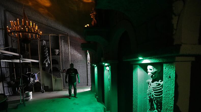 Work continues on the new Wine Cellar addition to the Face Your Fears Hotel of Terror. BILL LACKEY/STAFF