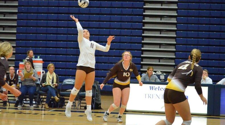 Kenton Ridge’s Dakota White returns the ball during a match earlier this season as Peyton Fleming (10) and Mallory Armentrout (4) look on. CONTRIBUTED PHOTO