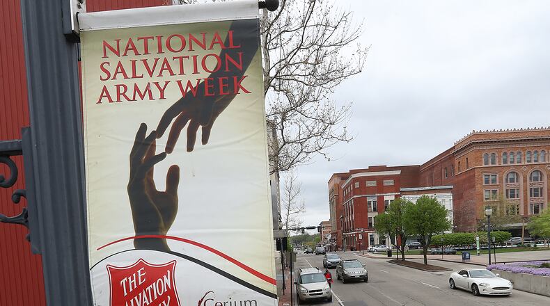Banners celebrating National Salvation Army Week May 9 -13 decorate the downtown Springfield core block Thursday, May 5, 2022. BILL LACKEY/STAFF