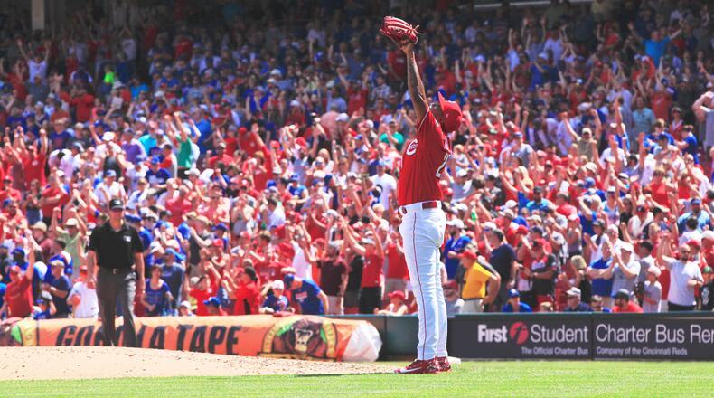 Reds closer Raisel Iglesias celebrates a victory over the Cubs on Sunday, June 24, 2018, at Great American Ball Park in Cincinnati. David Jablonski/Staff
