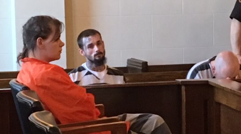 Travis Hypes appeared in court Friday and pleaded not guilty to murder and felonious assault charges.