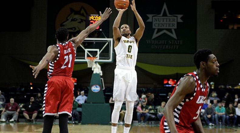 Senior Steven Davis scored a game-high 27 points to lead Wright State past Illinois-Chicago on Sunday at the Nutter Center. TIM ZECHAR/CONTRIBUTED