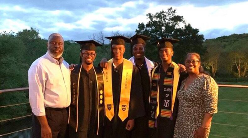 The internationally famous Wade quadruplets -Nick, Aaron, Nigel and Zachary - of Liberty Township are again making headlines as three graduated from Yale University recently and the fourth will do so in the fall. The four high-achievers from Lakota East High School - shown here after Yale's commencement bookended by father Darrin on left and mother Kim on right were spotlighted by national media in 2017 and again are being featured by national magazines and TV shows. From left to right are Nigel, Zachary, Nick and Aaron. (Provided Photo\Journal-News)
