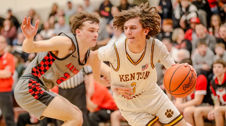 Kenton Ridge High School senior Ckai Rogan drives past Tecumseh senior Tim Moore, Jr. during their game on Friday night in Springfield. Michael Cooper/CONTRIBUTED