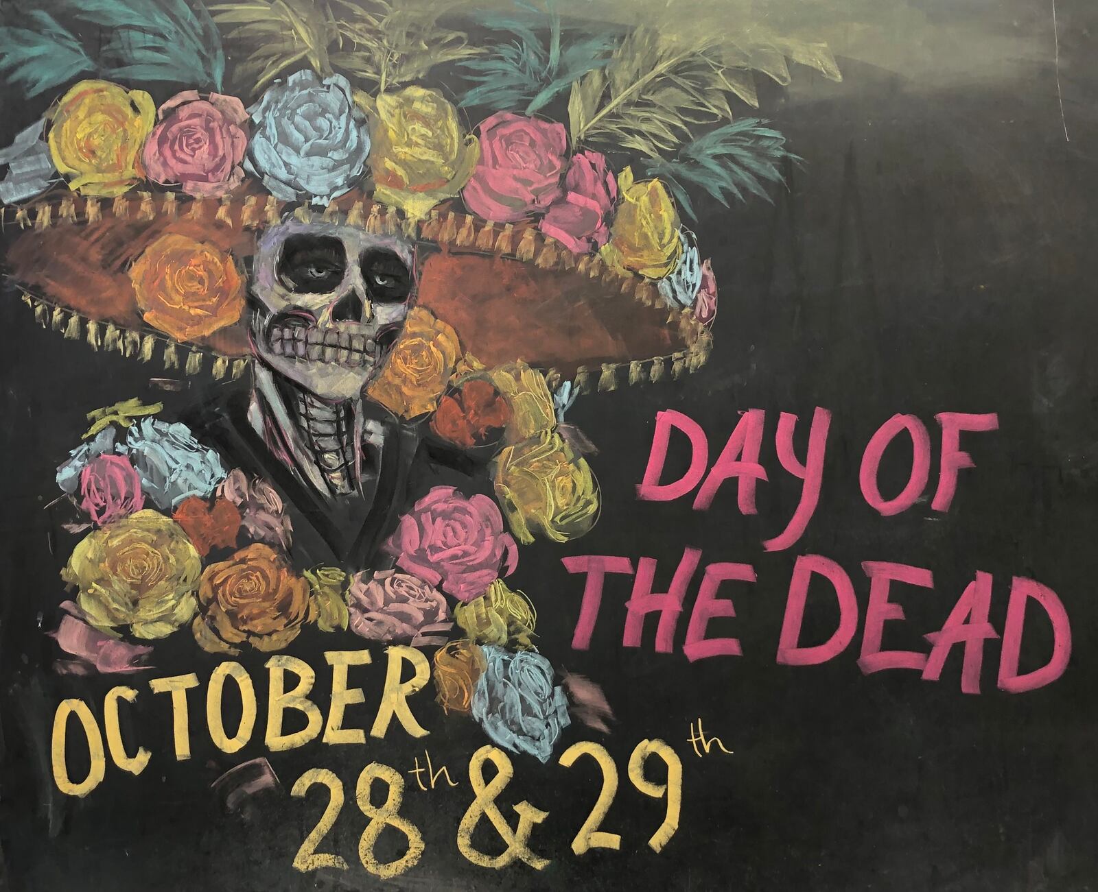 Carina Colvin loved to draw when growing up near Springfield. Now 24-year-old, Colvin's chalk drawings appeal to visitors to Current Cuisine deli and catering in Yellow Springs. CONTRIBUTED