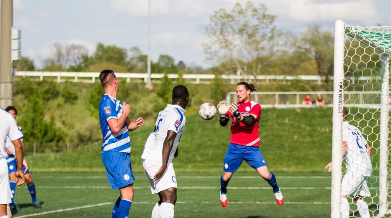 Dayton’s Corey Whisenhut makes a save during the Dynamo’s Blue vs. White exhibition match last month. CONTRIBUTED PHOTO