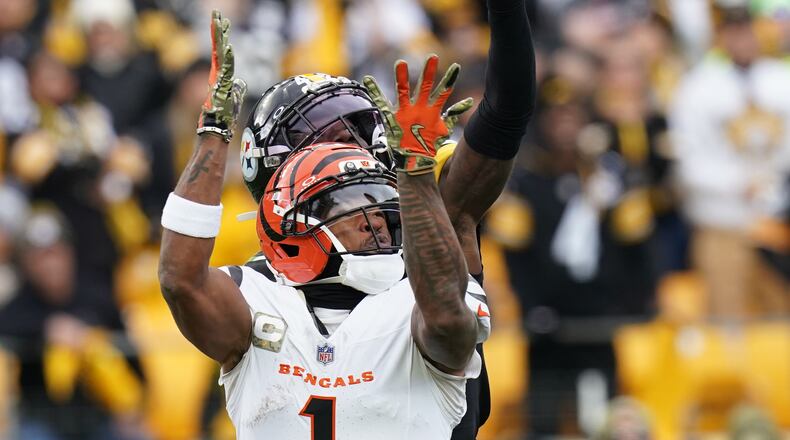 Pittsburgh Steelers cornerback James Pierre (42) breaks up a pass intended for Cincinnati Bengals wide receiver Ja'Marr Chase (1) during the first half of an NFL football game Sunday, Nov. 16, 2025, in Pittsburgh. (AP Photo/Matt Freed)