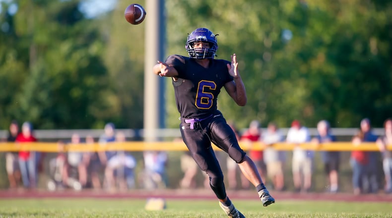 Mechanicsburg quarterback Jayden Roland rushed for 250 yards and three touchdowns and passed for 101 yards and another score in a 29-24 win over Triad last week. Michael Cooper/FILE PHOTO