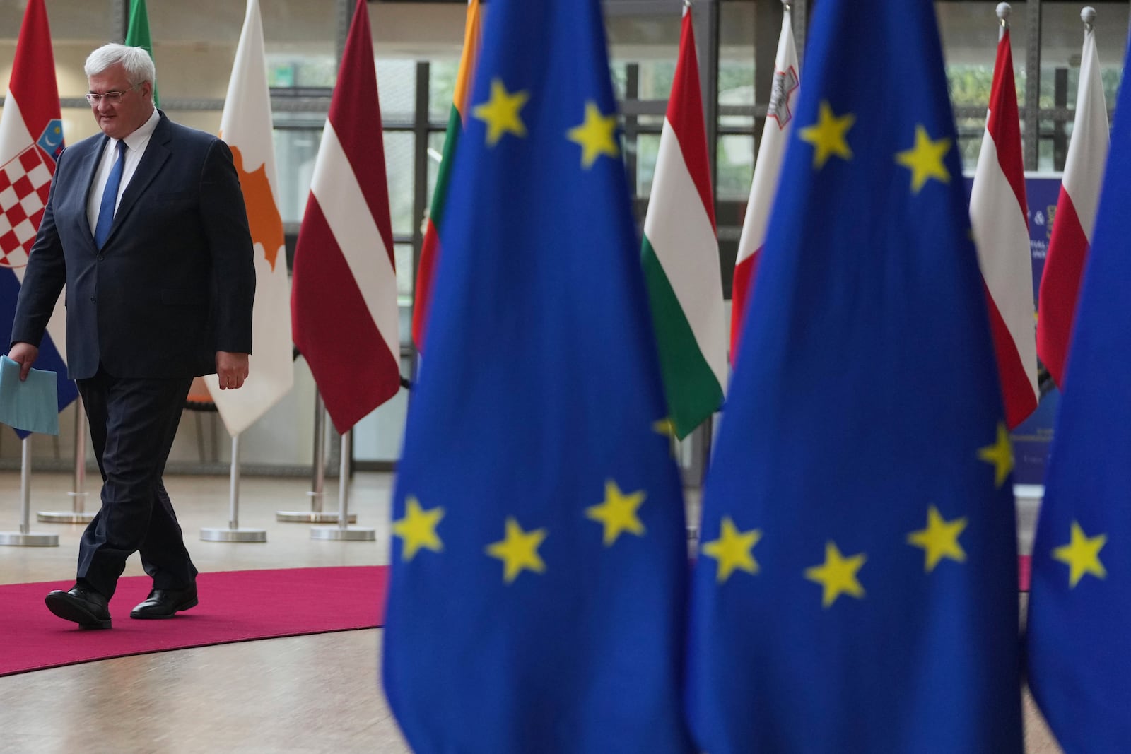 Ukraine's Foreign Minister Andrii Sybiha arrives for a meeting of EU foreign ministers at the European Council building in Brussels, Belgium, Tuesday, May 20, 2025. (AP Photo/Virginia Mayo, Pool)