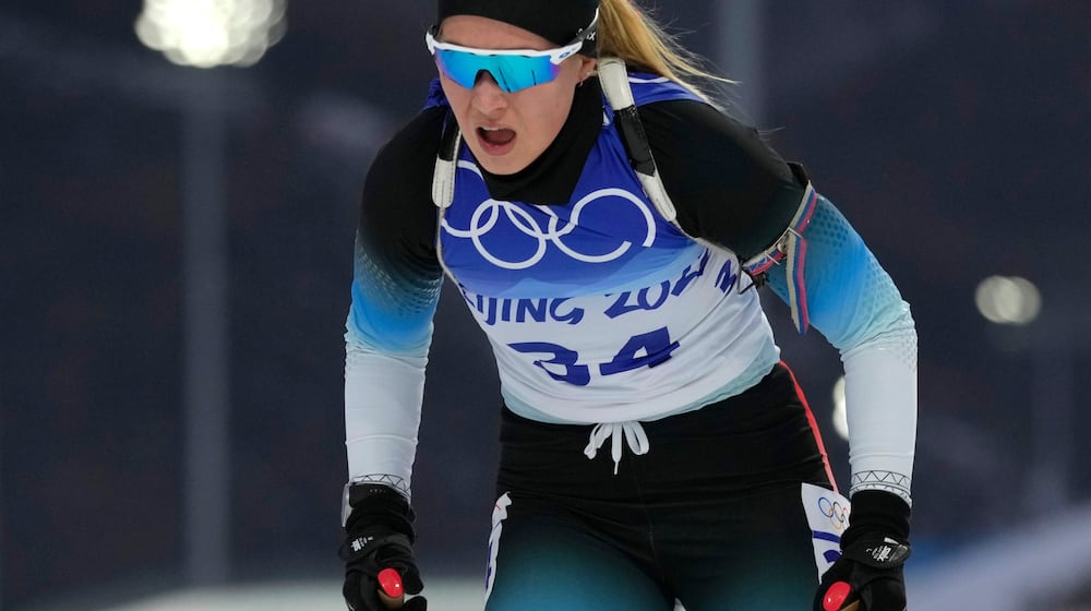 FILE - Ukaleq Astri Slettemark of Denmark skis during the women's 7.5-kilometer sprint competition at the 2022 Winter Olympics, Feb. 11, 2022, in Zhangjiakou, China. (AP Photo/Kirsty Wigglesworth, File)