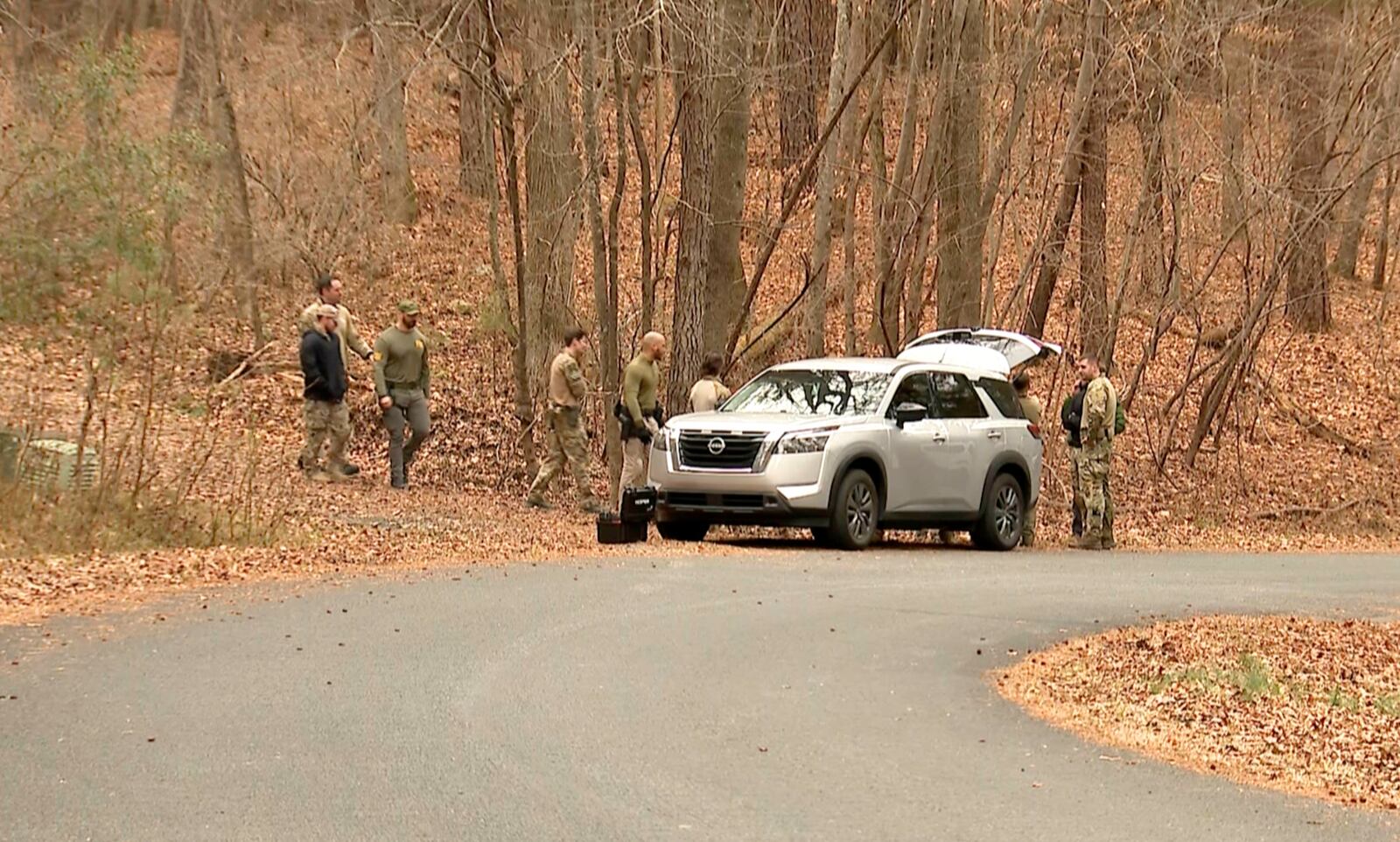 FILE - FBI agents search a neighborhood in Chapel Hill, North Carolina on Wednesday, Feb. 5, 2025, where Teresa Youngblut and Felix Bauckholt, who were involved in the shooting death of a U.S. Border Patrol agent in Vermont, had been renting homes in the neighborhood, their landlord told The Associated Press. (WRAL-TV via AP, file)