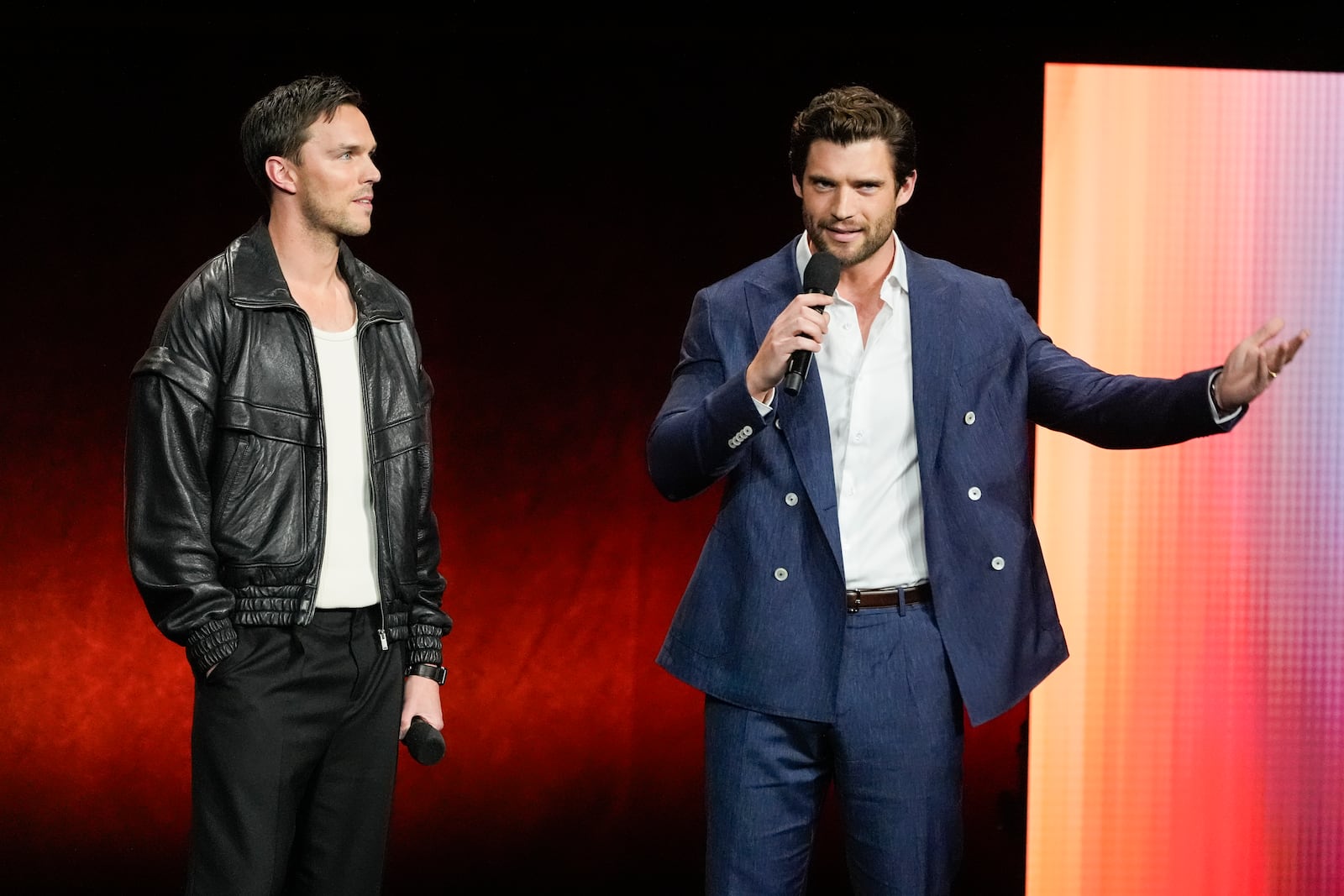 Nicholas Hoult, left, and David Corenswet, cast members of the upcoming film "Superman," speak during the Warner Bros. Pictures presentation at CinemaCon on Monday, April 1, 2025, at Caesars Palace in Las Vegas. (AP Photo/Chris Pizzello)