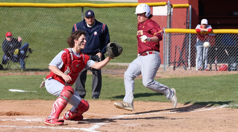 Northeastern High School senior Jake Nichols runs towards home plate as Fairbanks catcher Evan Blumenschein waits for the ball during their game on Friday evening in Springfield. Nichols was safe on the play and the Jets won 6-5. CONTRIBUTED PHOTO BY MICHAEL COOPER