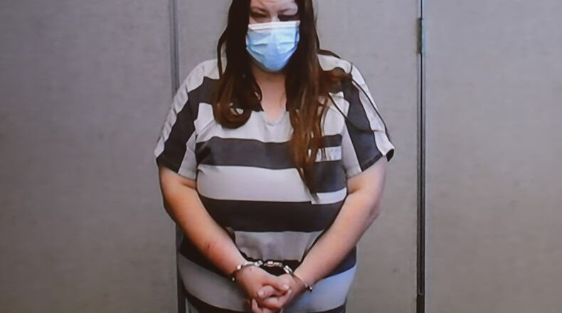 Erin Cole is arraigned in Clark County Municipal Court Thursday. BILL LACKEY/STAFF