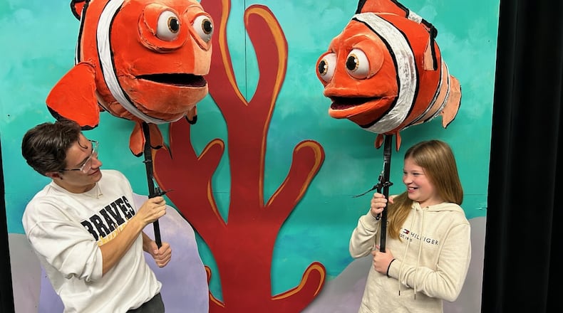 Keagin Ortiz, left, as Marlin, and Hazel Boyer as Nemo display their puppet characters for the Youth Arts Ambassadors' production of "Disney Pixar Finding Nemo Jr." on Friday and Saturday at the John Legend Theater. BRETT TURNER/CONTRIBUTED