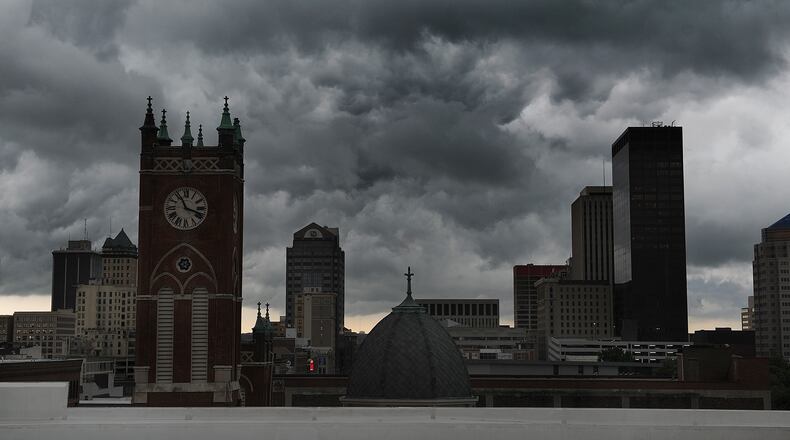 Storm clouds move over downtown Dayton, Wednesday, July 6, 2022. MARSHALL GORBY\STAFF