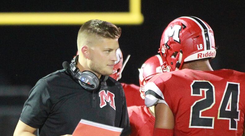 Ricky Davis is in his first season as the Madison High School varsity football head coach. MARC PENDLETON / STAFF