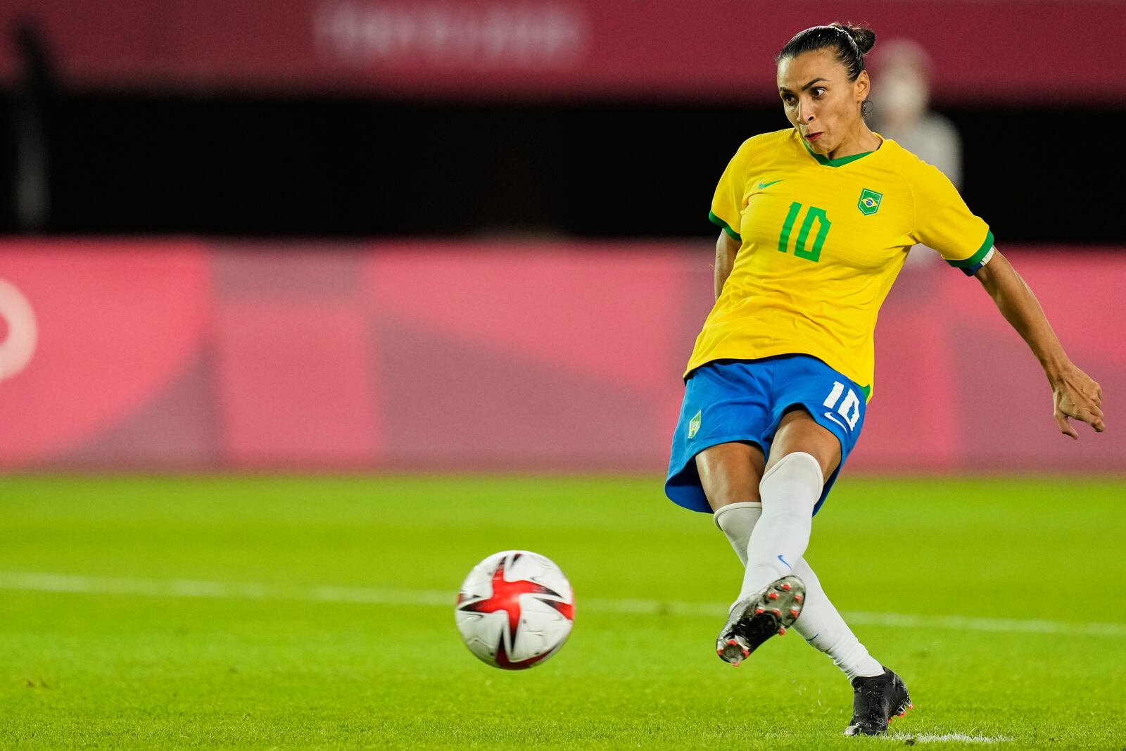 FILE - Brazil's Marta takes a penalty shot during a shootout in a women's quarterfinal soccer match against Canada at the 2020 Summer Olympics, Friday, July 30, 2021, in Rifu, Japan. (AP Photo/Andre Penner, File)