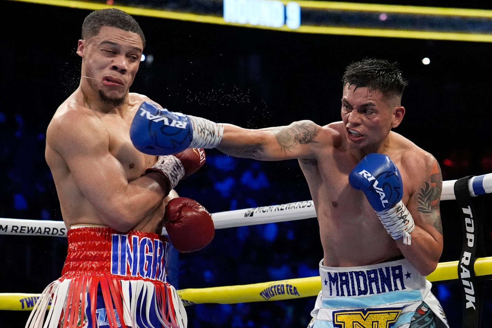 Fabian Maidana hits Rohan Polanco in a welterweight boxing match Sunday, May 4, 2025, in Las Vegas. (AP Photo/John Locher)