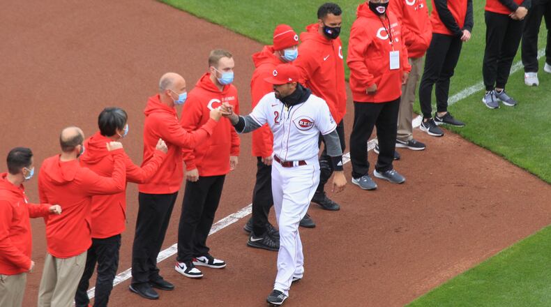 Nick Castellanos, of the Reds, is introduced on Opening Day on Thursday, April 1, 2021, at Great American Ball Park in Cincinnati. David Jablonski/Staff