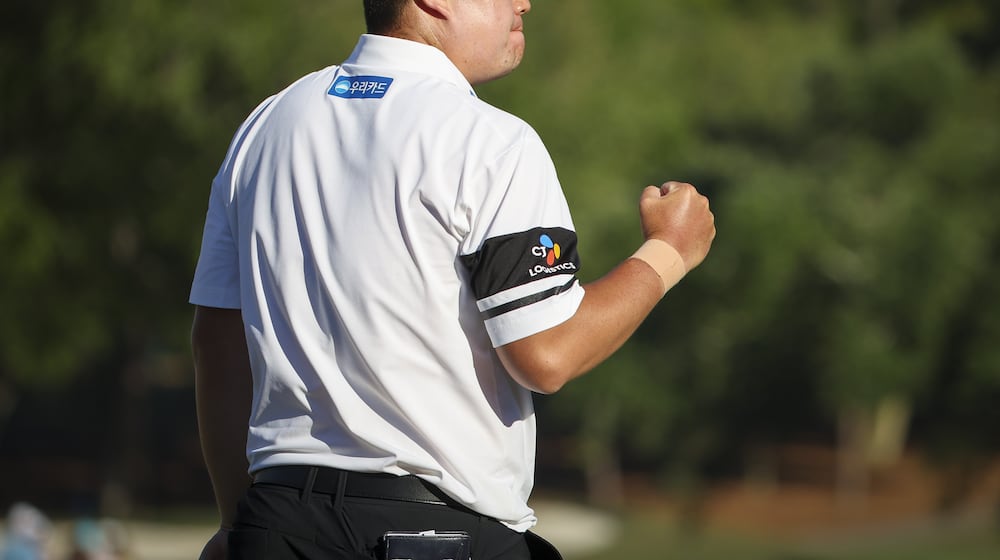 Sungjae Im pumps his fist after a birdie put on the 18th hole during the third round of the Valspar Championship golf tournament, Saturday, March 21, 2026, in Palm Harbor, Fla. (Chris Urso/Tampa Bay Times via AP)