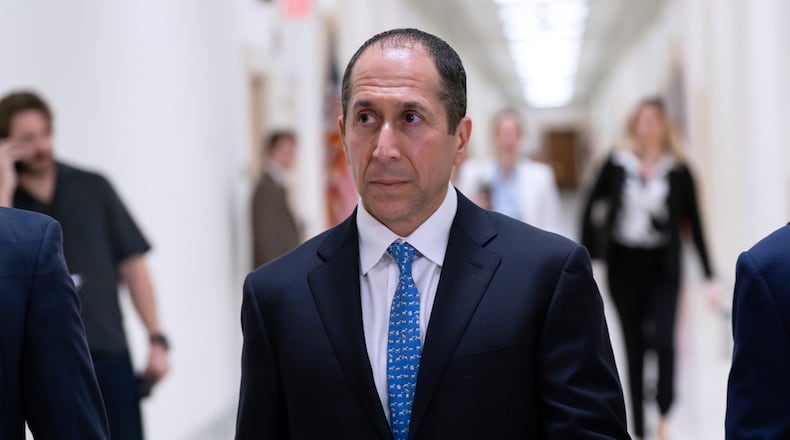 Richard Khan, Jeffrey Epstein's accountant and co-executor of his estate, arrives for his deposition before the House Oversight Committee on Capitol Hill, Wednesday, March 11, 2026, in Washington. (AP Photo/Jose Luis Magana)